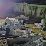 Petugas Pengurusan Jenazah Mangsa Covid Terbaring Keletihan. Petugas Pengurusan Jenazah Mangsa Covid Terbaring Keletihan.