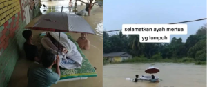 Lelaki Sanggup Meredah Banjir Demi Selamatkan Bapa Mertua Yg Lumpuh.